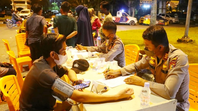 Polres Pelalawan Vaksinasi Pengunjung di Taman Kreatif